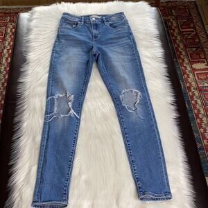 Levi’s 721 Ripped Knee High Rise Skinny Jeans